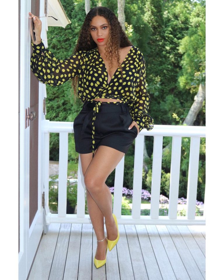 Beyoncé stuns in a fitted denim jumpsuit for a new ad for Ivy Park Rodeo